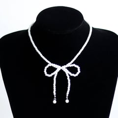 MANYA - Collar de mini perlas lazo