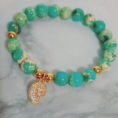 MARINO - Pulsera Oceans Piedras Naturales con Dije en Baño de Oro 18k