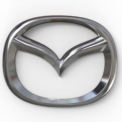 MARINO - EMBLEMA DELANTERO PLATEADO ORIGINAL MAZDA 2 SPORT